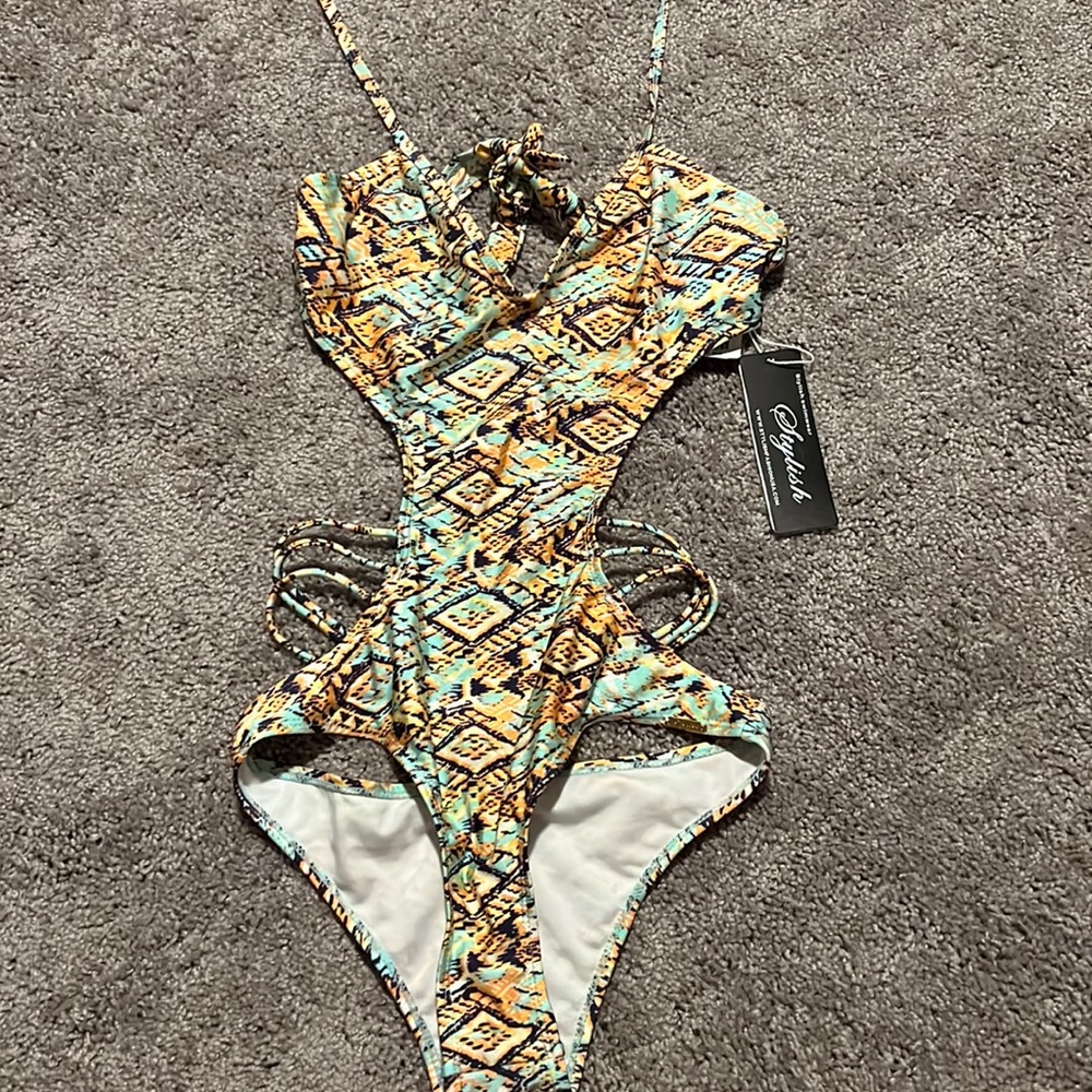 Multicolored one piece bathing suit. Medium